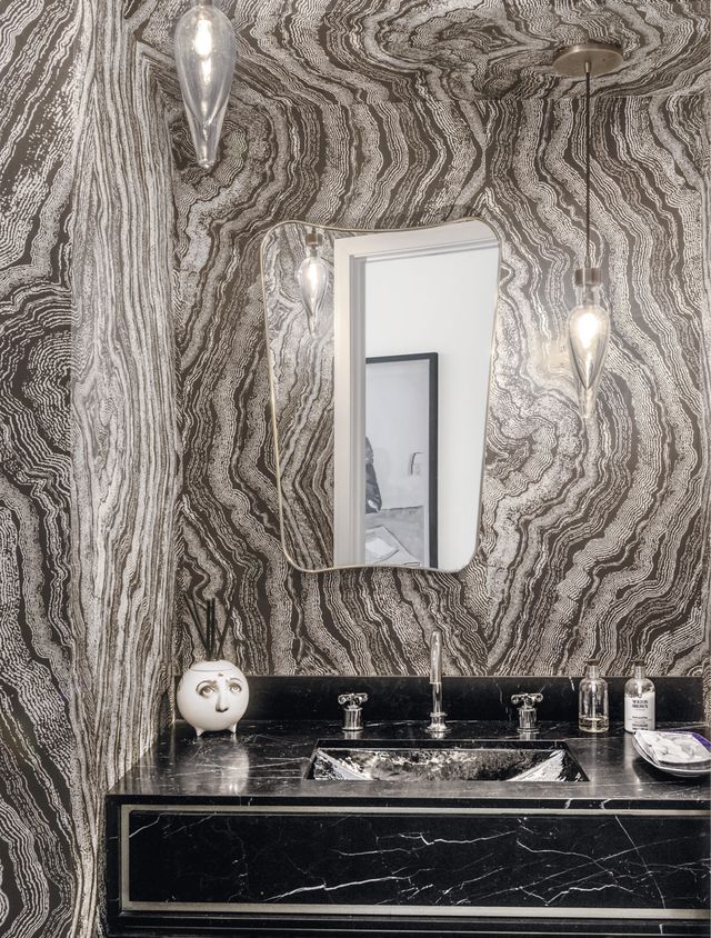 Room, Wallpaper, Wall, Mirror, Black-and-white, Interior design, Furniture, Material property, Tree, Table, 
