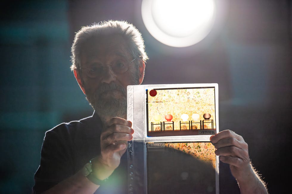 a man holding a game controller