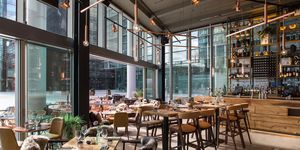 Glass, Table, Furniture, Interior design, Restaurant, Fixture, Chair, Daylighting, Transparent material, Cafeteria, 