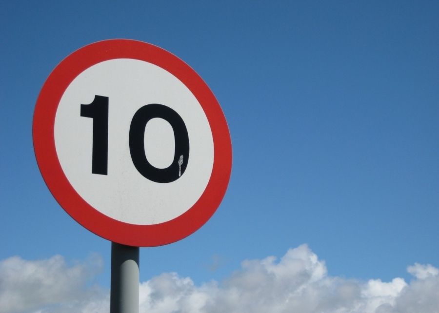 Sign, Traffic sign, Signage, Sky, Speed limit, Street sign, Cloud, Road, 