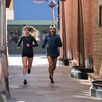 a man and woman running together a man and woman running together