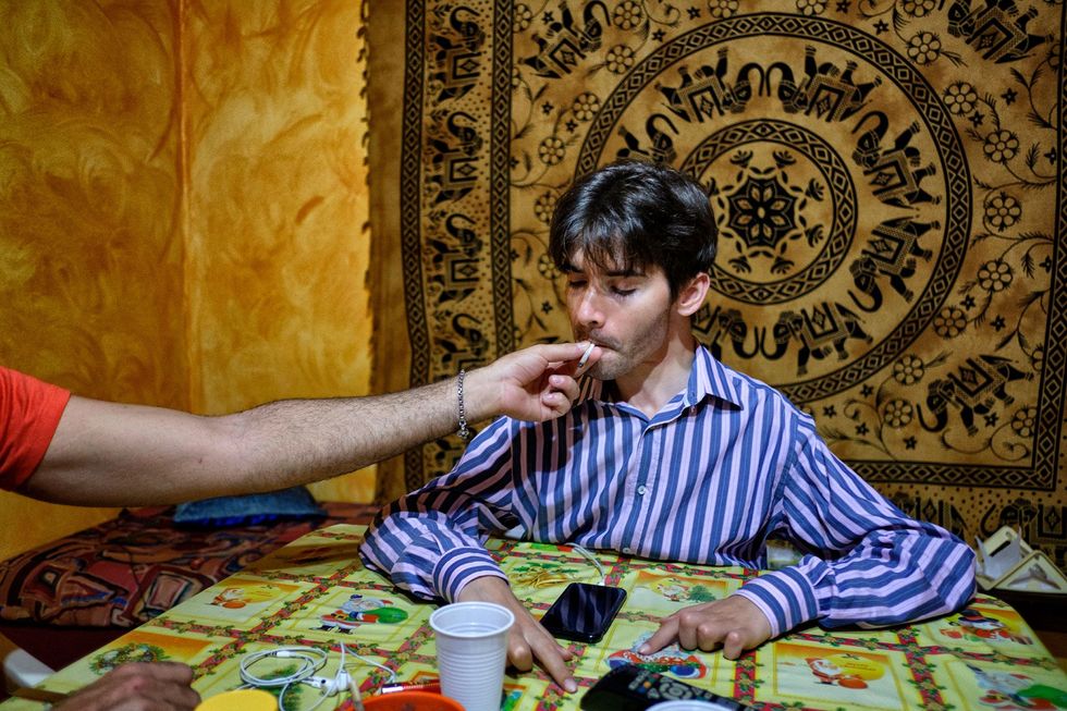 36yearold Alberico Nobile who became quadriplegic after a car accident smokes cannabis in his house with the help of his friend Vincenzo Due to his condition Bastianelli says Albericos parents and friends roll cannabis cigarettes every hour to give him his therapy Talsano Taranto Italy 2016