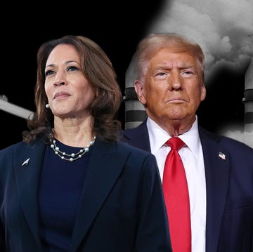 Harris vs. Trump: Their Policies on Climate Change harris and trump are positioned in the foreground, dressed in formal attire, in the background, there are wind turbines on one side and smoke billowing from industrial smokestacks on the other, set against a stark black backdrop