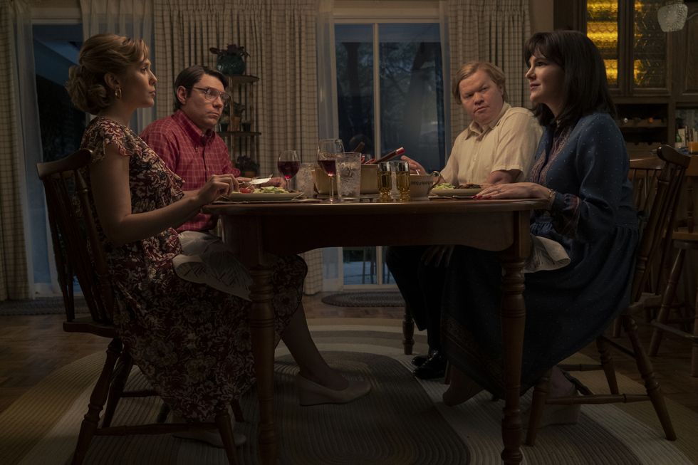 elizabeth ﻿olsen, patrick fugit, jesse plemons and lily rabe sit at a table during a scene in love and death