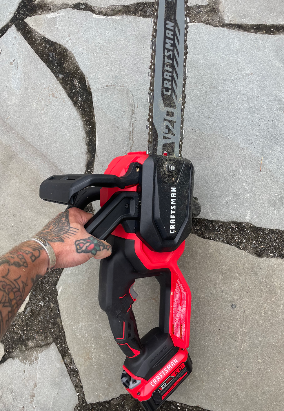a mini chainsaw from craftsman during field testing
