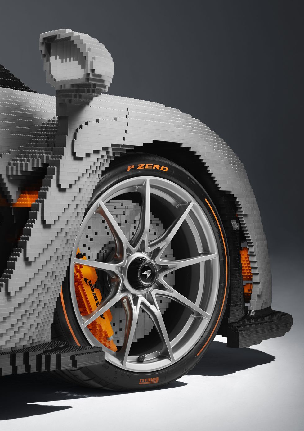 Tire, Wheel, Automotive tire, Vehicle, Rim, Alloy wheel, Automotive design, Orange, Spoke, Auto part, 