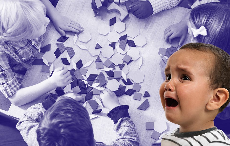 Parents and toddlers playing with a puzzle 