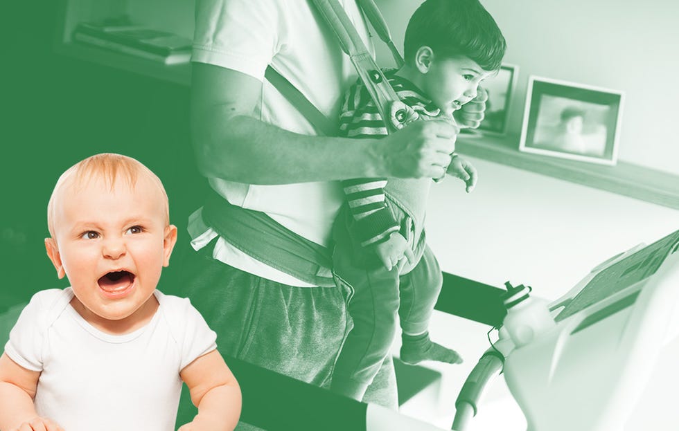 Parent running on a treadmill with a baby in a carrier on his chest