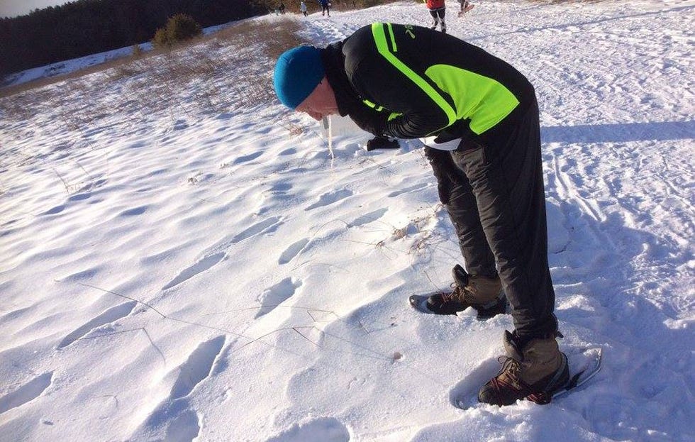 A runner throwing up beer 