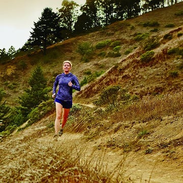 woman running through fields woman running through fields