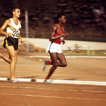 Gold medalist Naftali Temu of Kenya leads silver medalist Ron Clarke of Australia in the 6-mile event during the British Empire and Commonwealth Games in Kingston, Jamaica, on August 6, 1966. Gold medalist Naftali Temu of Kenya leads silver medalist Ron Clarke of Australia in the 6-mile event during the British Empire and Commonwealth Games in Kingston, Jamaica, on August 6, 1966.