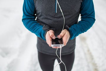 man with music running