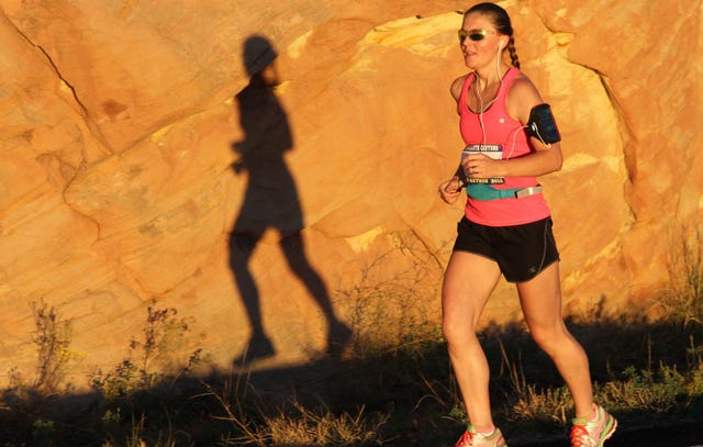 Heather Parke running the 2015 All About Marathon Training on a Treadmill, in Utah.