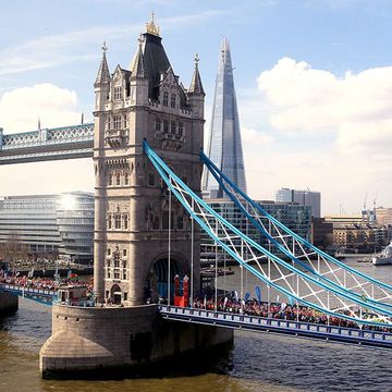 Runners crossing the Tower Bridge at the London Marathon 