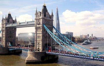 Runners crossing the Tower Bridge at the London Marathon 