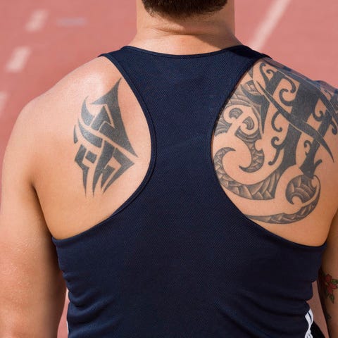 a tattooed runner