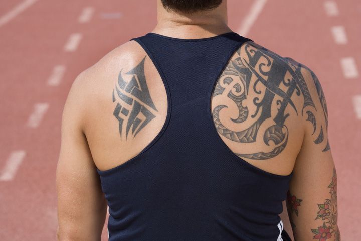 a tattooed runner