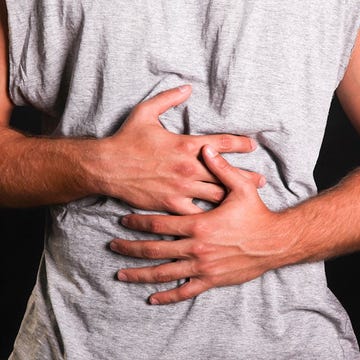 man with stomach ache man with stomach ache