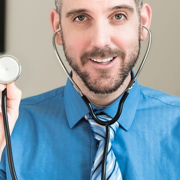 Doctor getting ready for an exam Doctor getting ready for an exam