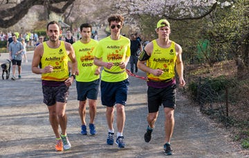 Charles Catherine (middle) and Andrew Tonner (right) train with Matt Leibman 33, (left) and Matt Karr, 34, (middle, back), both of whom guided Charles in the 2016 Boston Marathon.