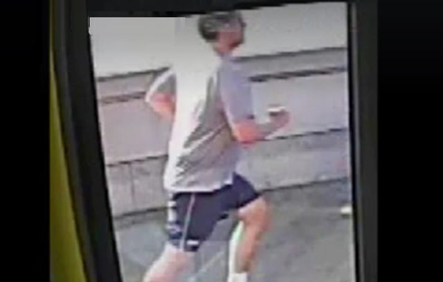 Jogger pushes man in front of bus