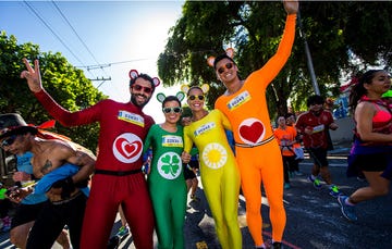 Four runners in costume together 