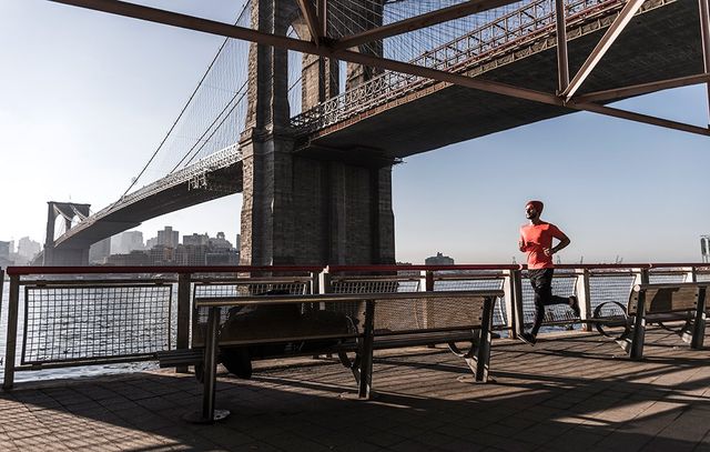 Man running near Brooklyn Bridge