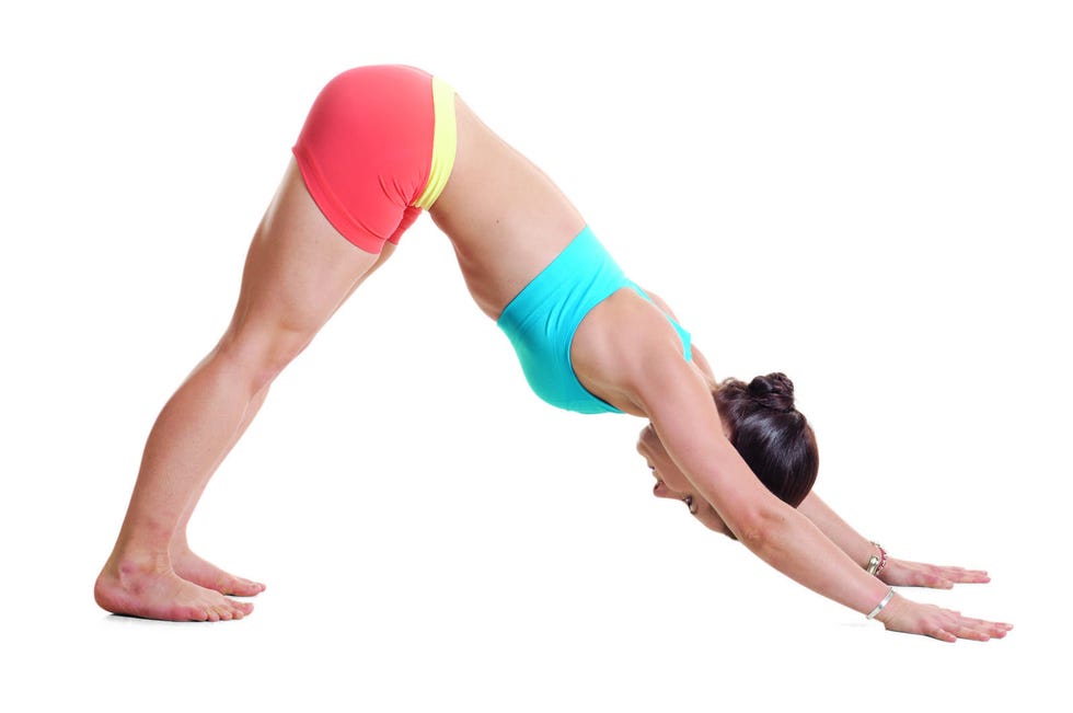 woman hunches over with arms and feet on floor