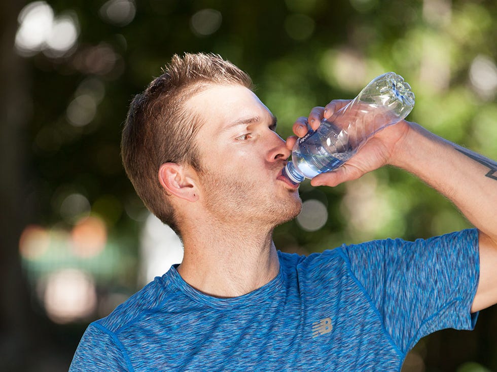 man drinking water