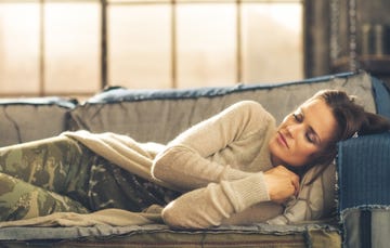 Woman napping on couch