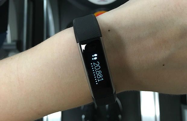 a Fitbit tracker showing 20,000 miles