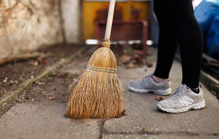 sweeping with a broom