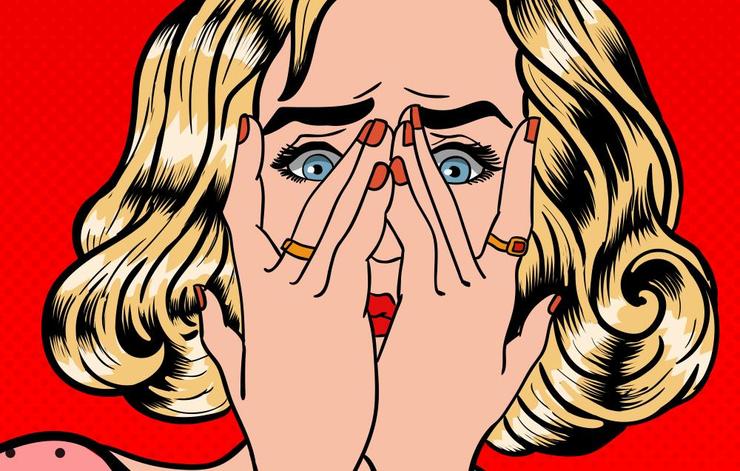 Woman covering eyes