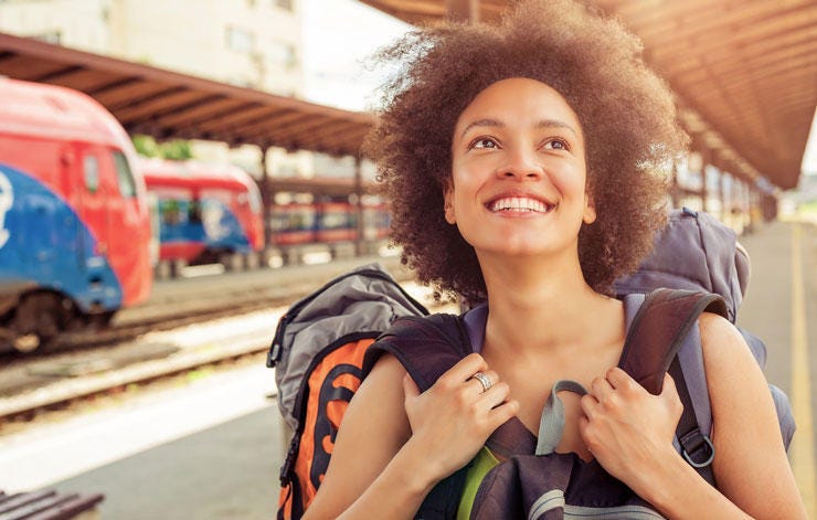 Smiling woman traveling