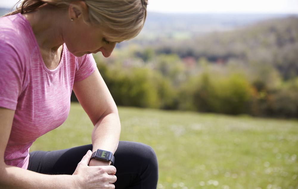 Woman looking at tracker