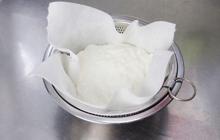 straining out the whey