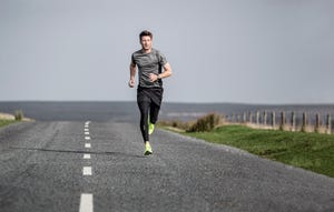 a man running on a road