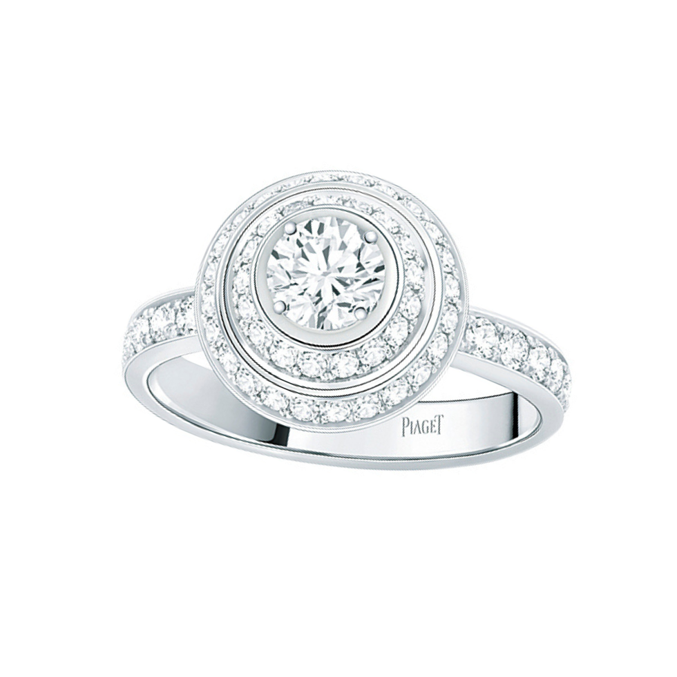 a silver ring with diamonds
