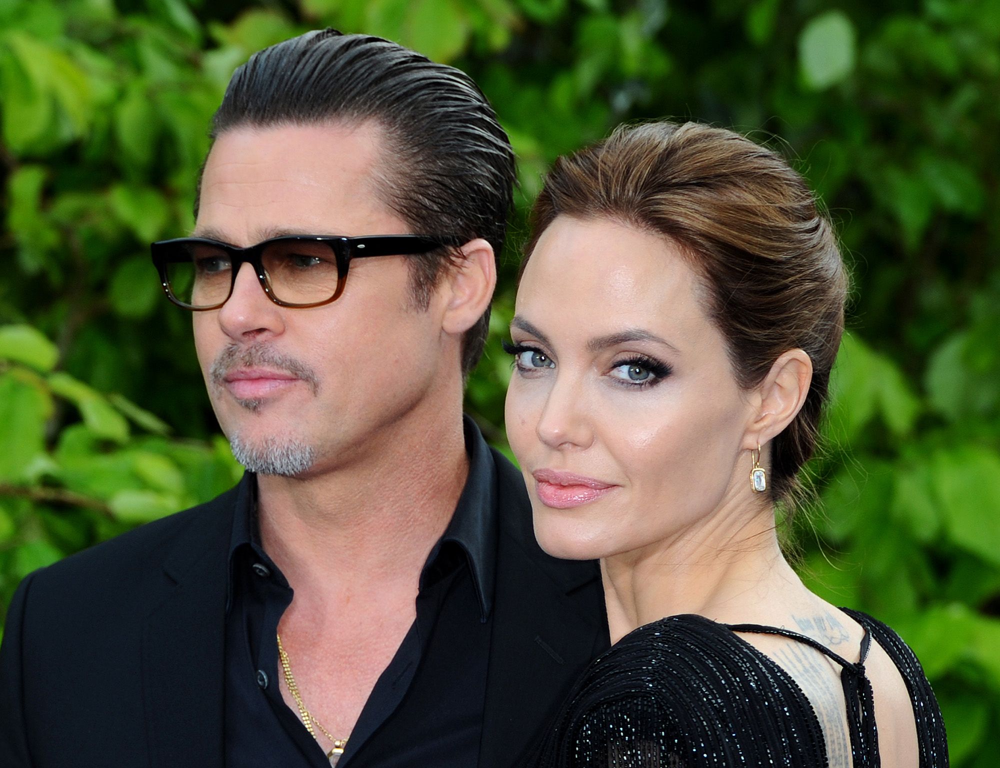 brad pitt and angelina jolie fight over child support