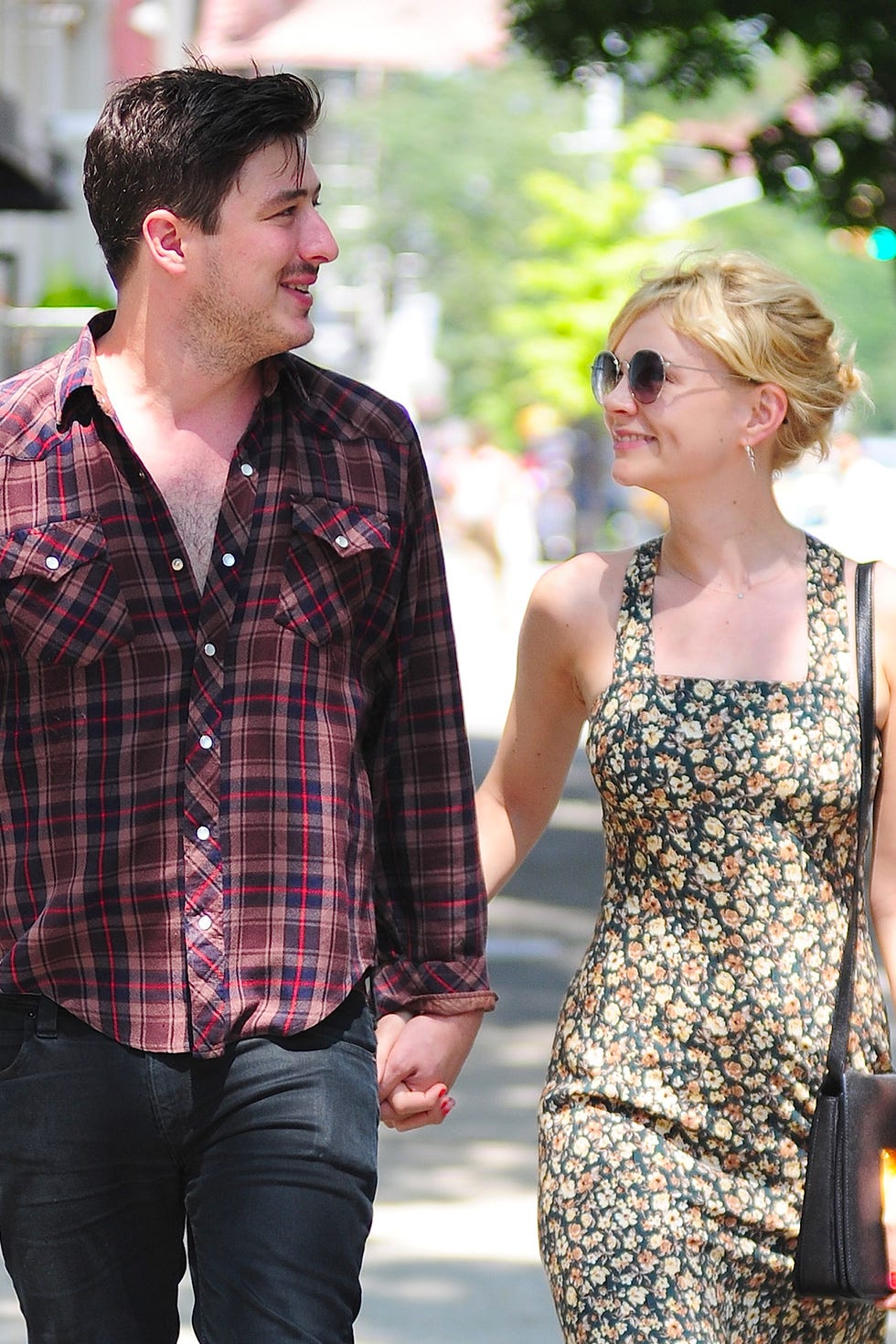 Clothing, Plaid, Jeans, Fashion, Interaction, Holding hands, Pattern, Design, Gesture, Textile, 