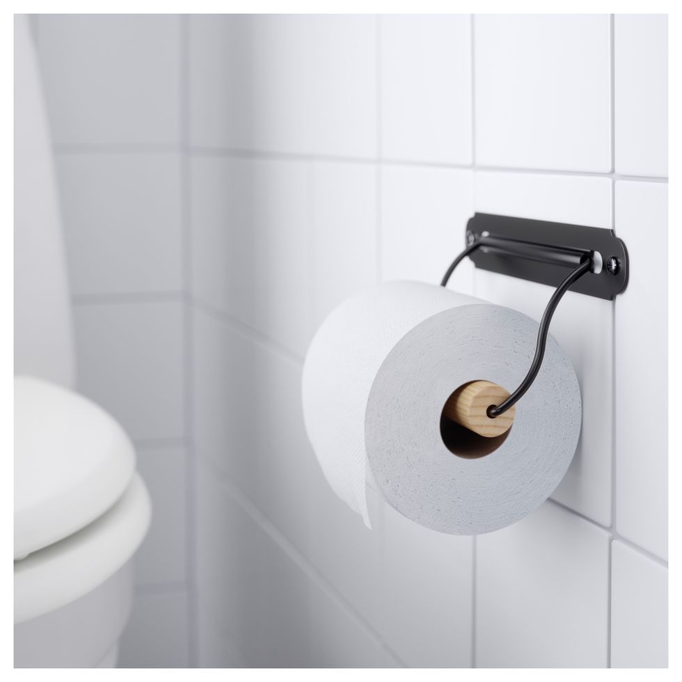 Bathroom accessory, Wall, Toilet paper, Toilet roll holder, Tile, Material property, Room, Toilet, Plumbing fixture, Beige, 