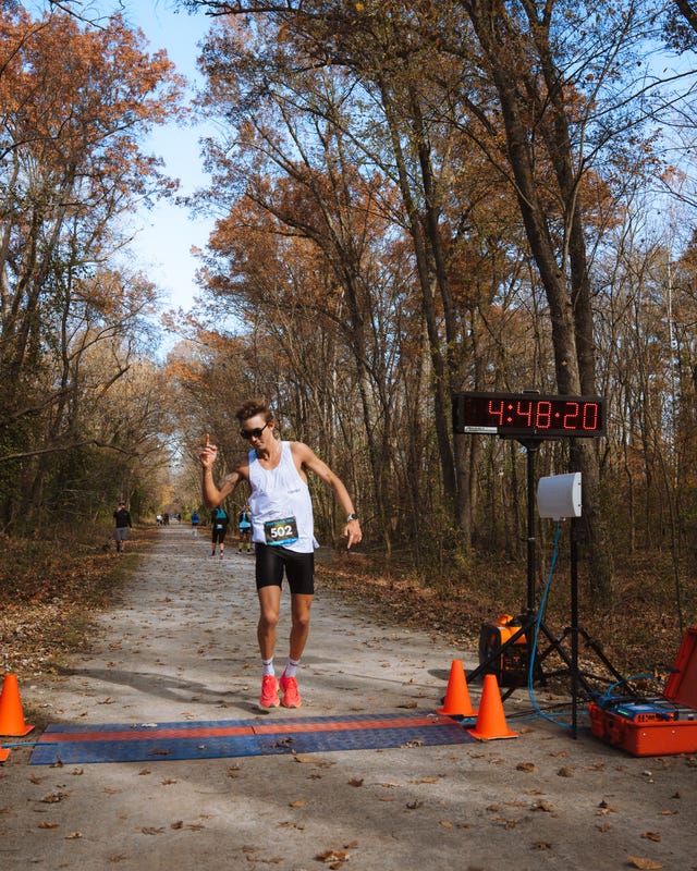 charlie lawrence crossing the finish line