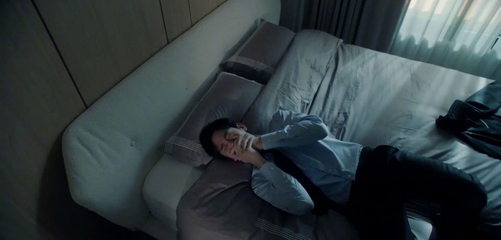 a person lying on a couch