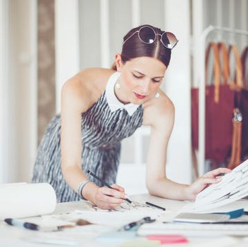 a person looking at a piece of paper