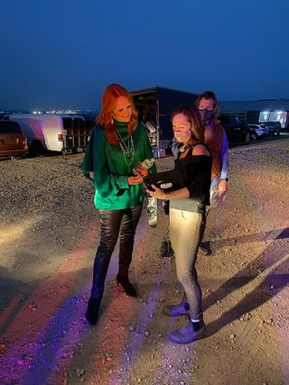 ree drummond and director ellie kanner on the set of "candy coated christmas" on discovery plus