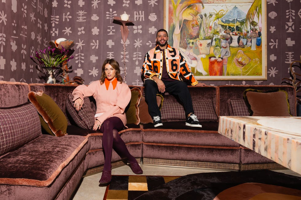 Stylish interior with two people seated in a modern living room.