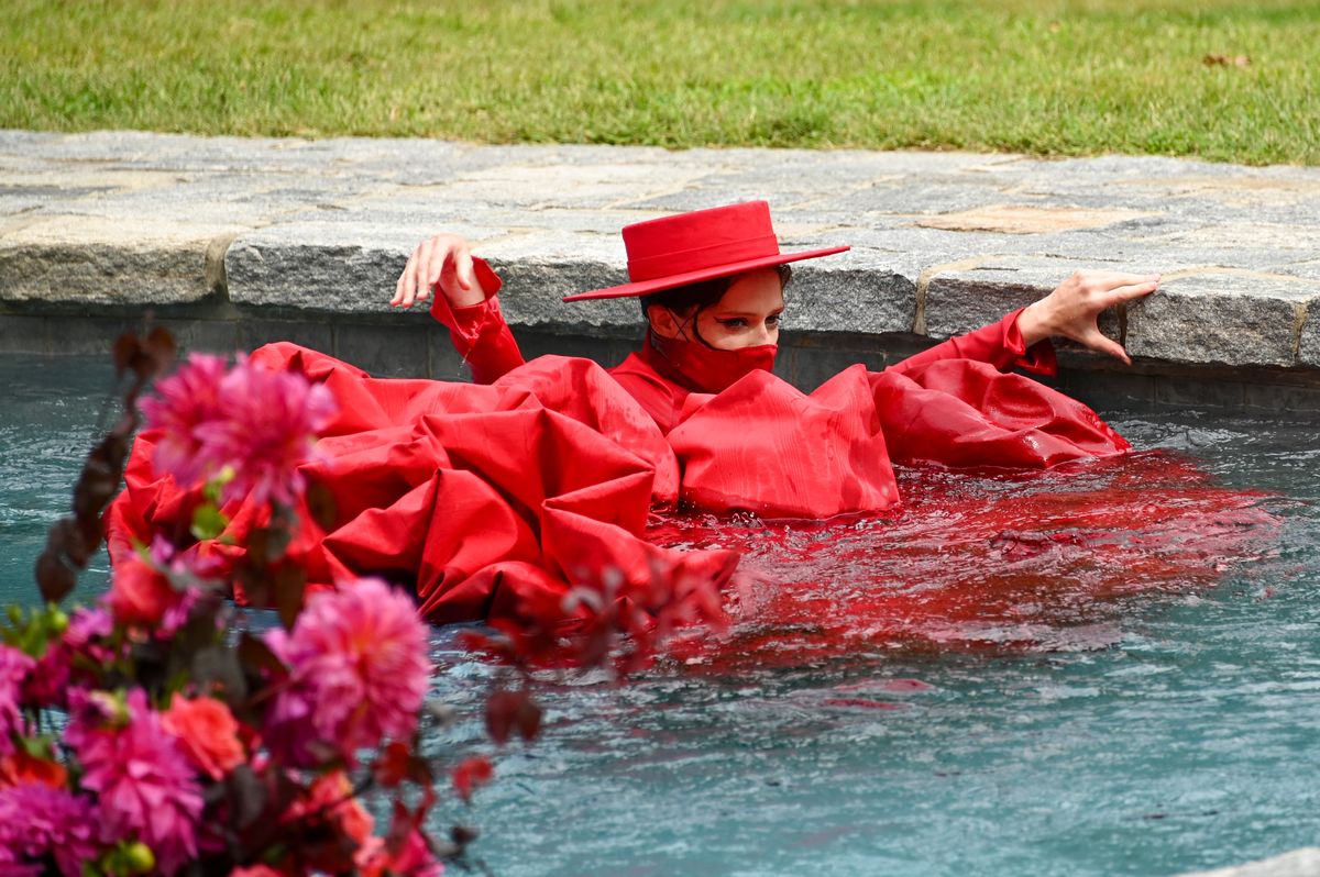 westport, connecticut   september 17 coco rocha swims in the pool at the runway for the christian siriano collection 37 2020 fashion show on september 17, 2020 in westport, connecticut photo by mike coppolagetty images for christian siriano