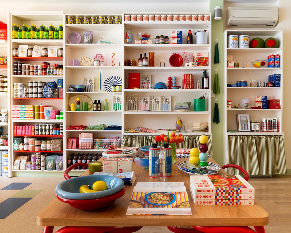 A well-organized retail space showcasing a variety of food items and kitchenware.