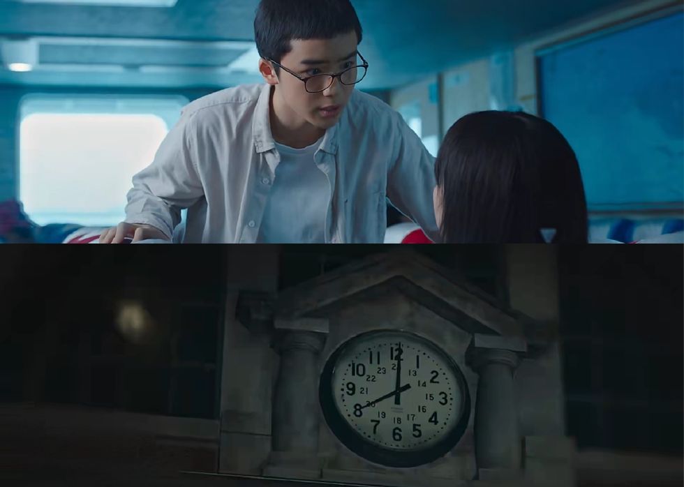 a man and a woman looking at a clock
