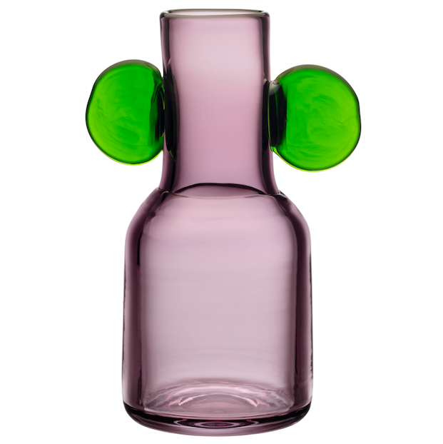 a purple bottle with a green cap